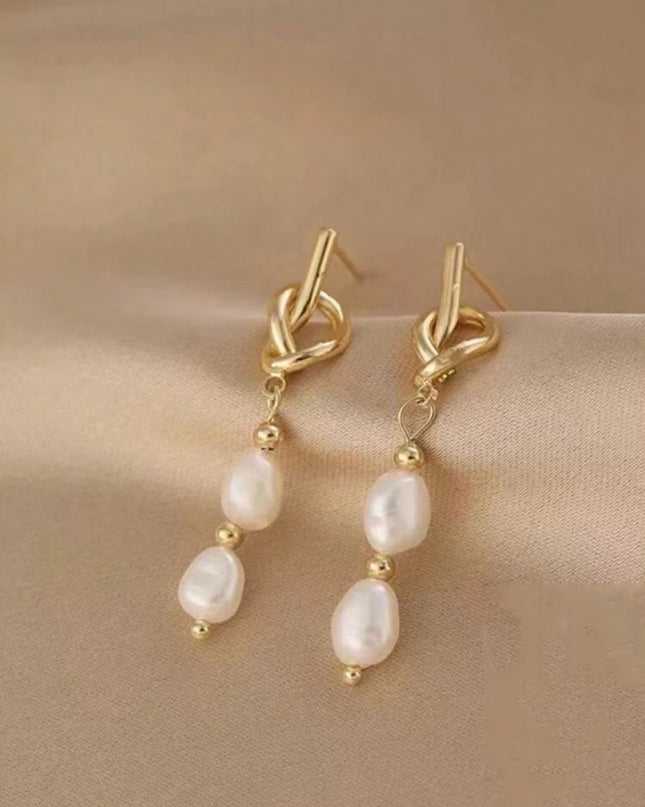 Pendientes Dorados Nudo con Piedras Blancas
