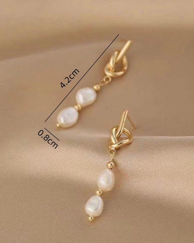 Pendientes Dorados Nudo con Piedras Blancas