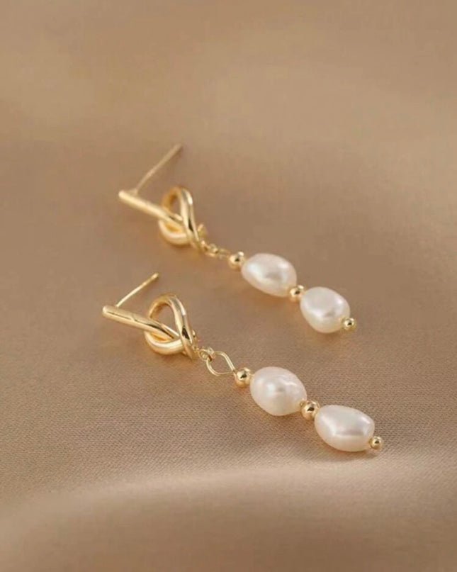 Pendientes Dorados Nudo con Piedras Blancas
