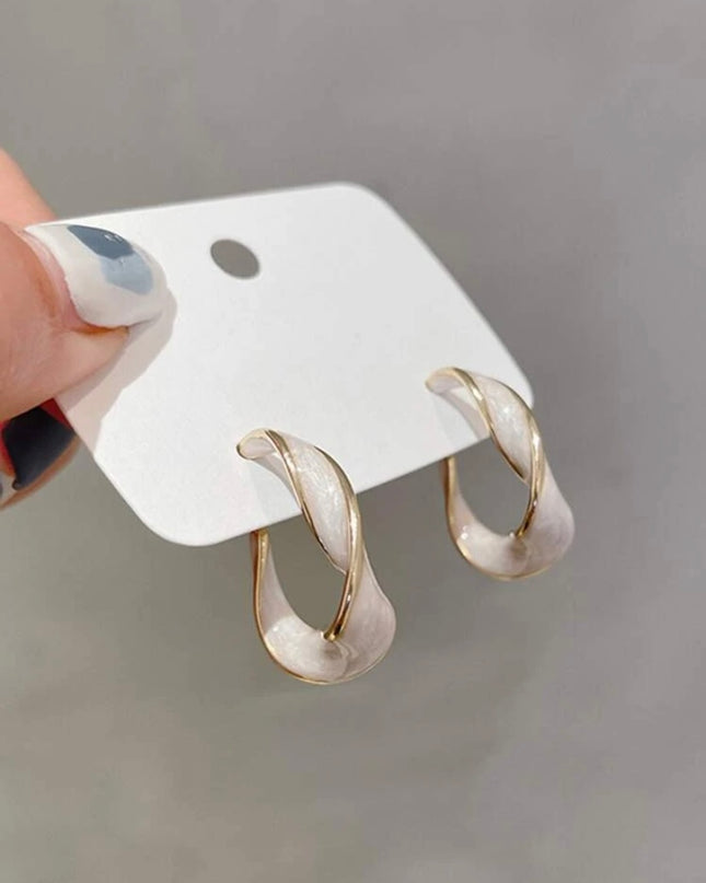 Argollas Blancas con Detalles Dorados