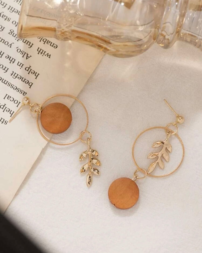 Aretes Círculos con Hojas Doradas
