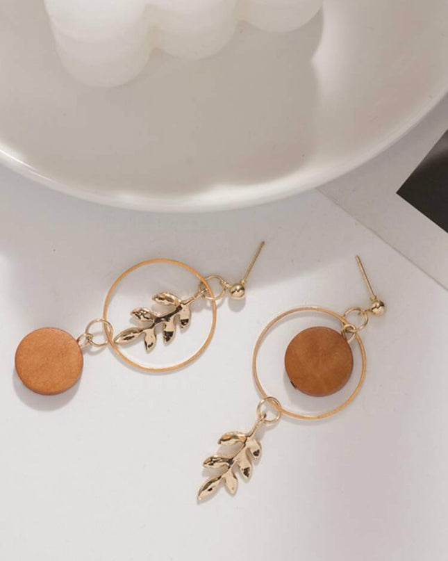 Aretes Círculos con Hojas Doradas