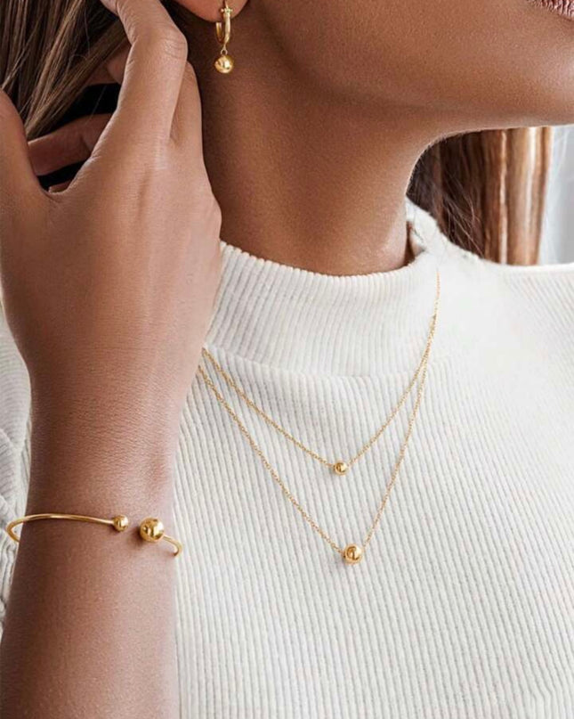 Conjunto de collar, pulsera y aretes Diseño de Esferas