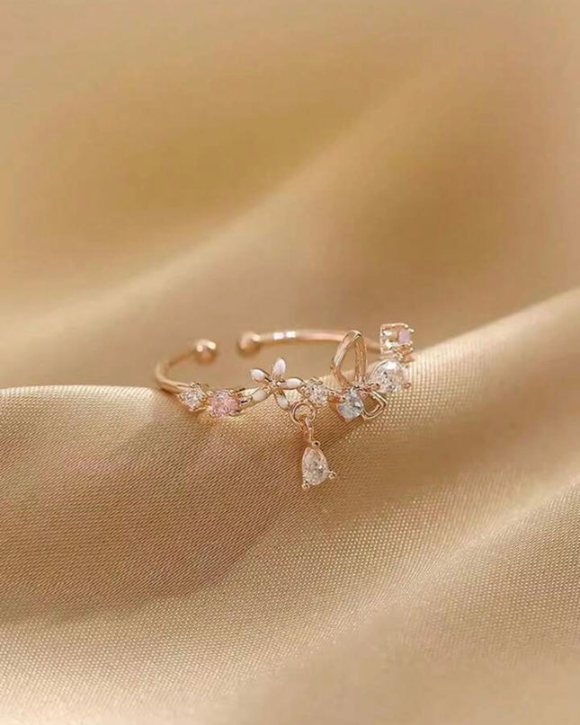 Anillo Abierto con forma de Flor color oro rosa con Circonita Cúbica