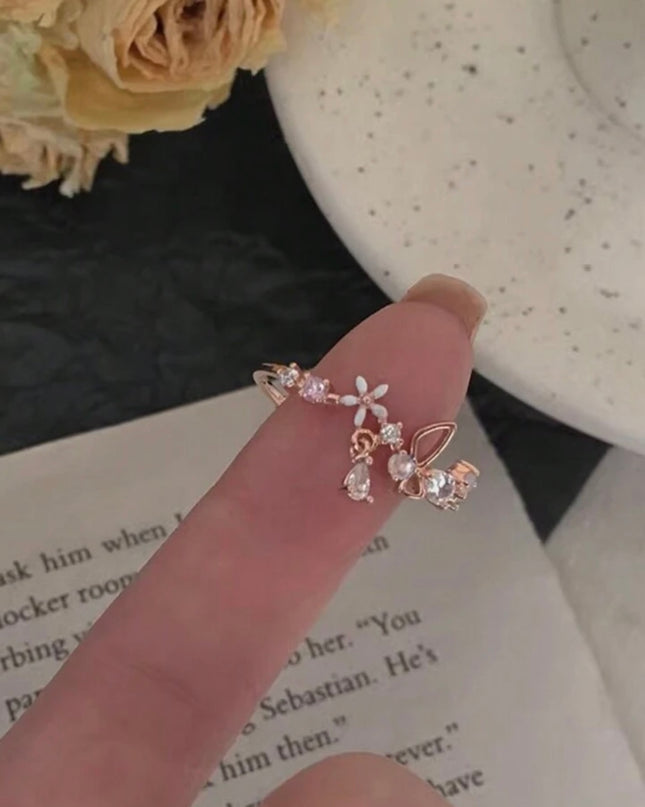 Anillo Abierto con forma de Flor color oro rosa con Circonita Cúbica