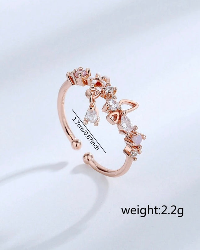 Anillo Abierto con forma de Flor color oro rosa con Circonita Cúbica