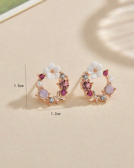 Aretes Circulares con Detalles Rosados con Flor